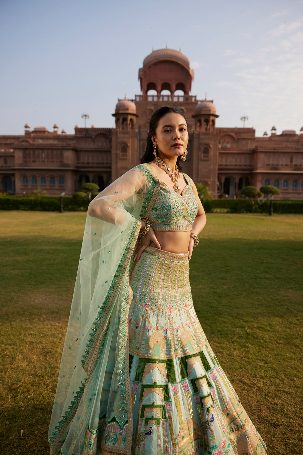 "Morni" Pastel Green Hand Embroidered Peacock Motifs Lehenga Set